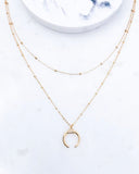 Layered ball chain necklace with horn crescent pendant