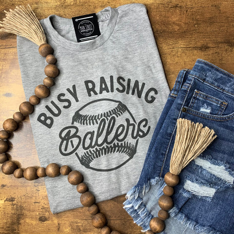 Busy Raising Ballers graphic tee