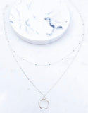 Layered ball chain necklace with horn crescent pendant